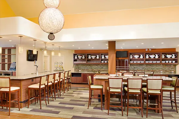 Complimentary hot breakfast buffet with eggs, bacon, fruit at Hyatt House LAX