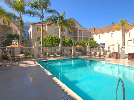 Heated outdoor pool and deck at Hyatt House